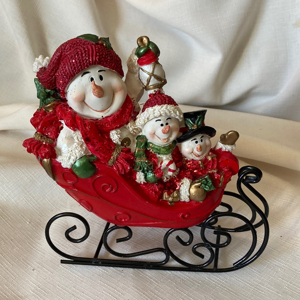 Snowman Family in sleigh